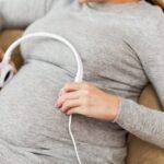 When can you hear the baby's heartbeat?